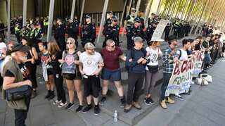 Dozens arrested as Australia mining protest turns violent