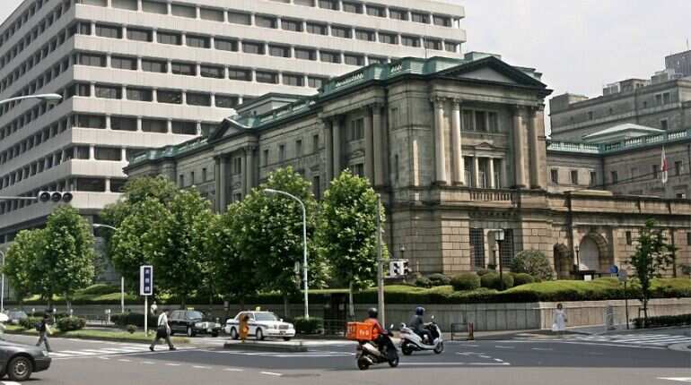 Bank of Japan suggests future rate cut, but holds fire for now