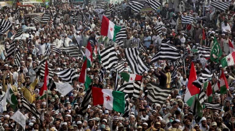 Pakistani protesters descend on capital to demand Prime Minister Khan quits