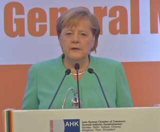 On Berlin Wall anniversary, Merkel urges Europe to defend 'democracy, freedom'