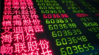 Though yearly gains lag, Asian shares outperformed global peers in December