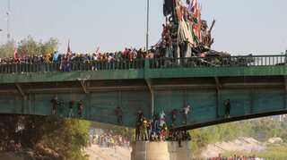 Protesters block roads to Iraqi port, demand end to &#x27;foreign meddling&#x27;