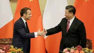 China and France sign deals worth $15 billion during Macron's visit