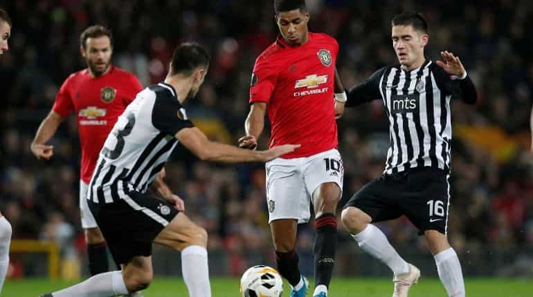 Europa League: Manchester United brush Partizan aside to reach last 32