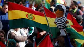 Slingshots and dynamite as Bolivians clash over election