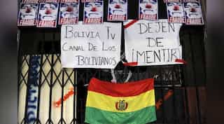 Protesters seize state-run media in Bolivia as tensions soar