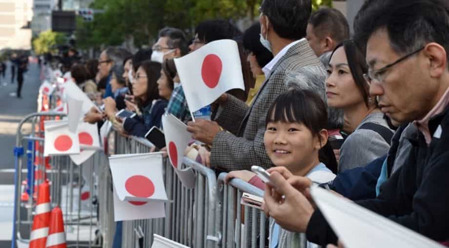 Thousands gather ahead of rare Japan imperial parade Thousands gather ahead of rare Japan imperial parade