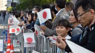 Thousands gather ahead of rare Japan imperial parade
