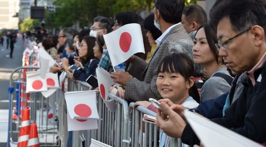 Thousands gather ahead of rare Japan imperial parade