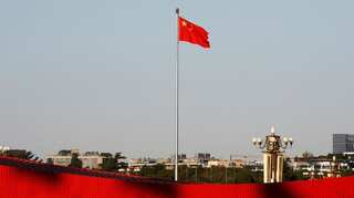 China cuts new benchmark rate to boost economy