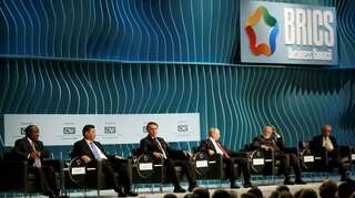 BRICS leaders rail against 'bullying' protectionism