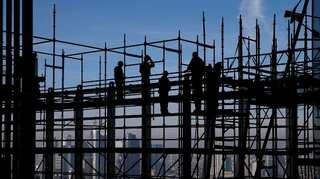 'Suffering' German economy dodges recession in third quarter