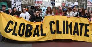 Why action on climate change gets stuck and what to do about it