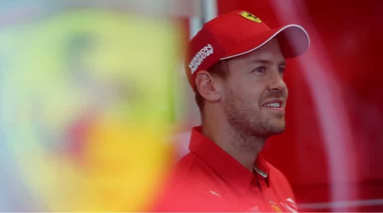 Vettel bows out of Ferrari with a song and a trophy Vettel bows out of Ferrari with a song and a trophy