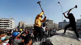 Protesters spill back onto bridge in Iraq capital