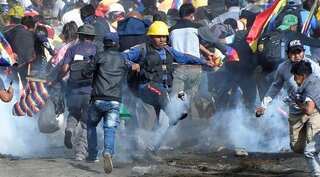 Bolivian police battle with Morales supporters, death toll jumps to 8; over 100 injured