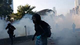 Hong Kong police fire rubber bullets at university protesters