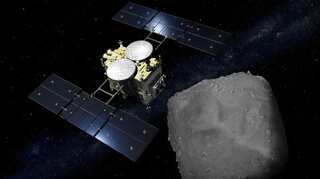 Japan space probe on its way back after asteroid mission