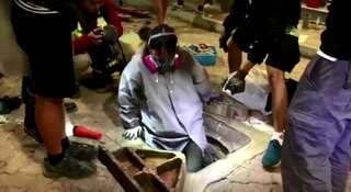 Hong Kong: Protesters defy Lam's surrender warning as authorities struggle to free university campus