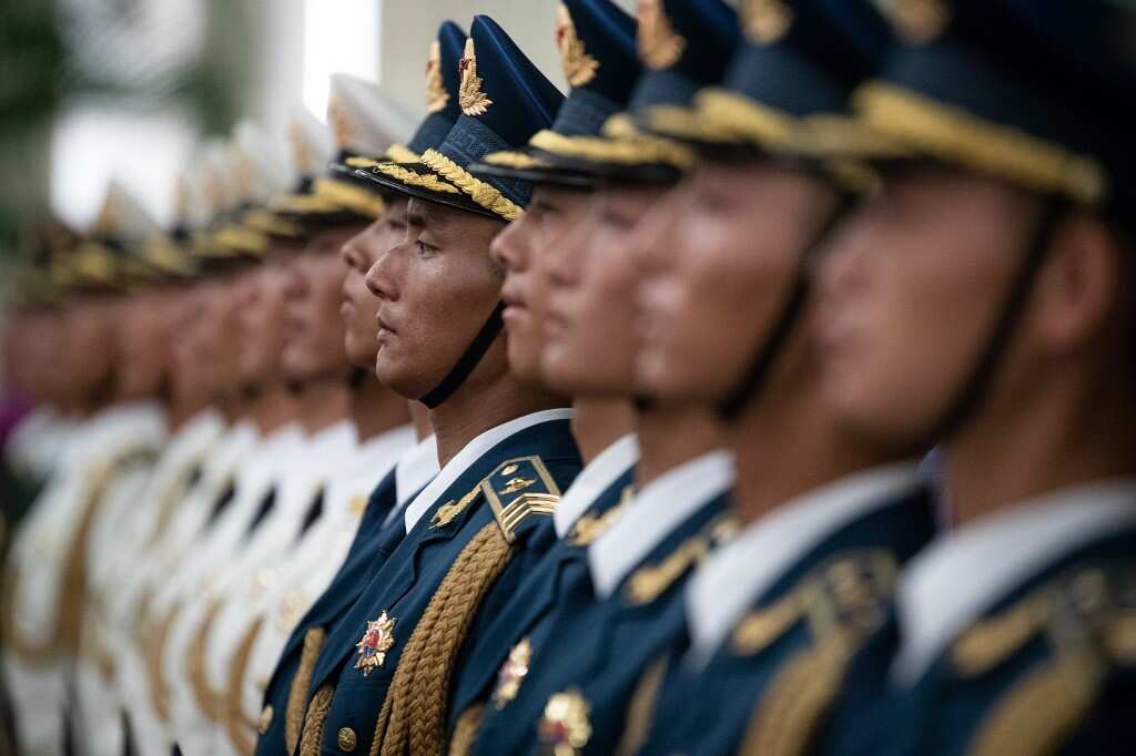 Chinese soldiers in riot gear practice drills near Hong Kong university: Witness