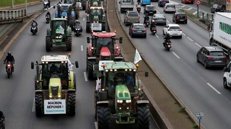French farmers clog highways to protest at 'agri-bashing' French farmers clog highways to protest at 'agri-bashing'