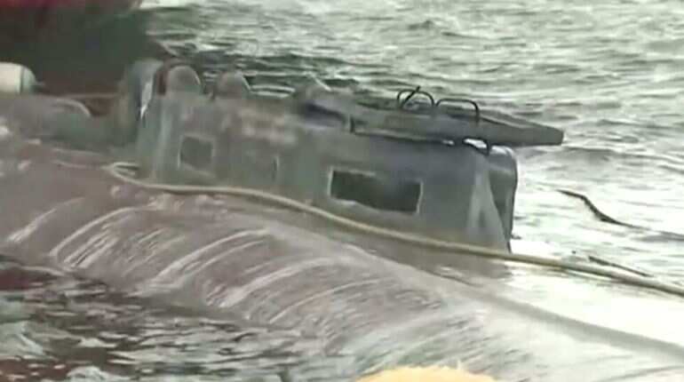 Spain refloats submarine intercepted with suspected cocaine on board Spain refloats submarine intercepted with suspected cocaine on board