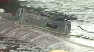 Spain refloats submarine intercepted with suspected cocaine on board