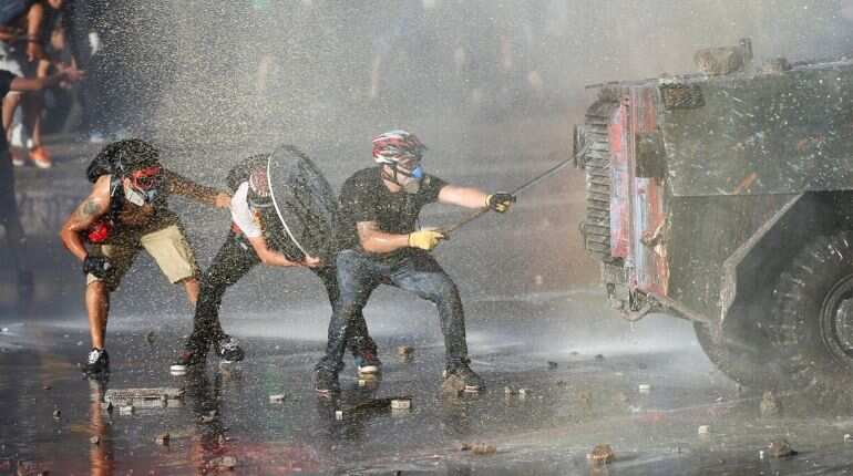 Chilean lawmakers warn democracy at stake as violence spikes Chilean lawmakers warn democracy at stake as violence spikes