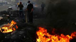 Protesters burn tyres in southern Iraq in renewed anti-government rage