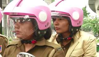 Pretty in pink: Delhi police's women patrol unit ride pink scooters