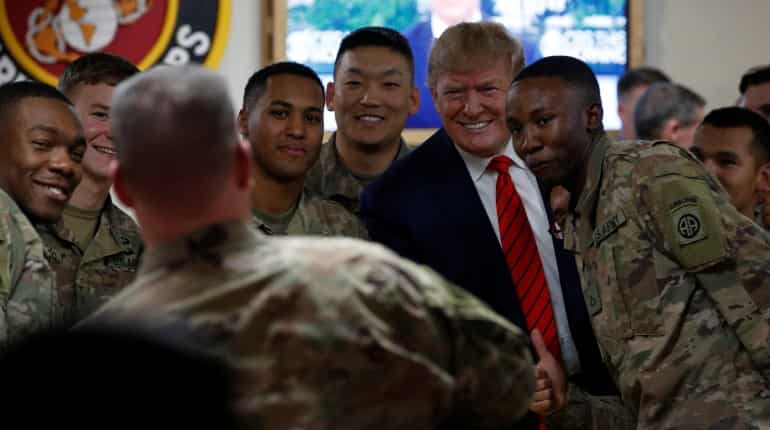 No phones, scripted tweets: How Trump's Afghanistan trip was kept under wraps