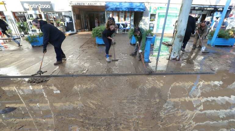 Six die, including rescuers in floods in southern France
