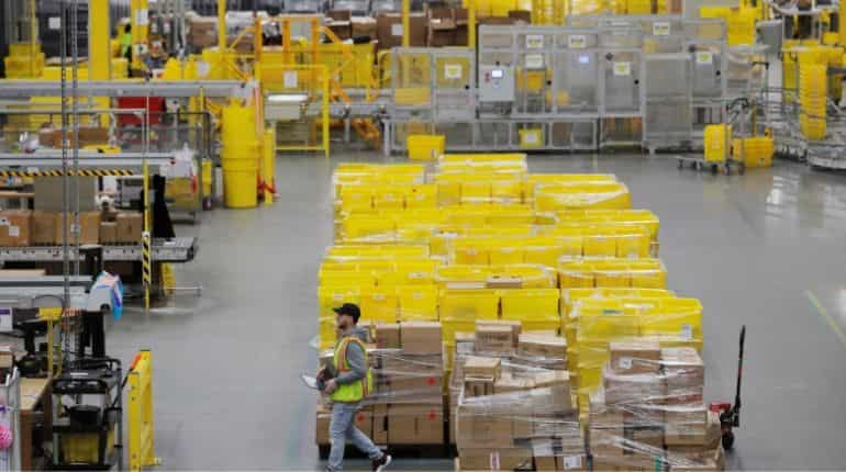 Growing tide of coronavirus cases hit Amazon warehouses Growing tide of coronavirus cases hit Amazon warehouses