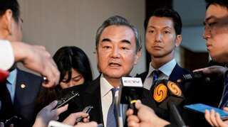 Top Chinese diplomat visits South Korea to improve relations after four-year gap