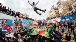Pro-paramilitary demonstrators flood Iraqi protest camp