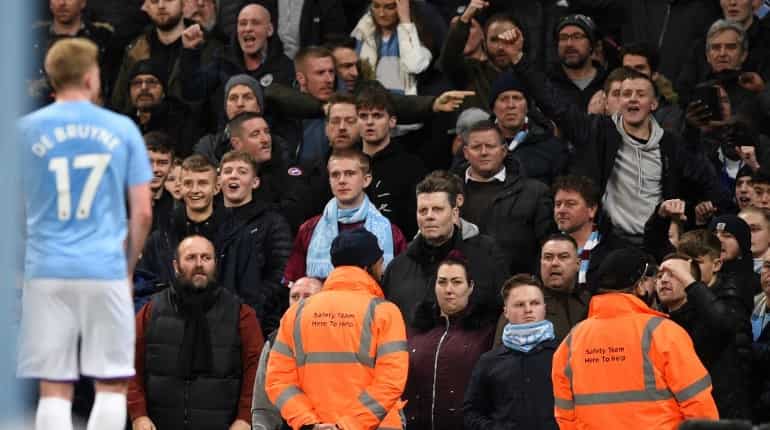 Man arrested for making racial gestures during Manchester derby Man arrested for making racial gestures during Manchester derby