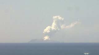 Spitting volcano keeps search parties off New Zealand island