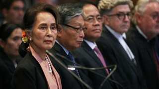 Myanmar's Suu Kyi arrives at U.N. court for genocide hearings