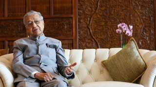 Malaysia's Mahathir pledges to step down for Anwar, but not before November