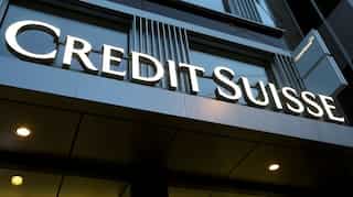 Credit Suisse cuts profit goals as revenue hopes fall short