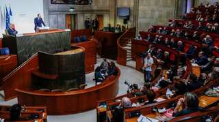 France's prime minister defies unions with pension overhaul