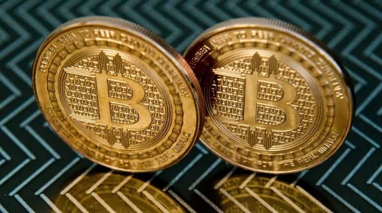 Bitcoin recoups some losses in Asia after plunging on Chinese crackdown