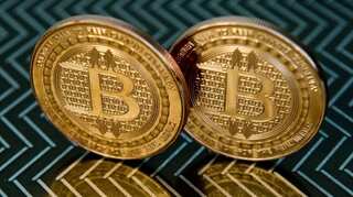 Bitcoin recoups some losses in Asia after plunging on Chinese crackdown