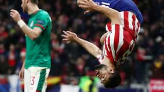 Atletico Madrid stroll into Champions League knockouts