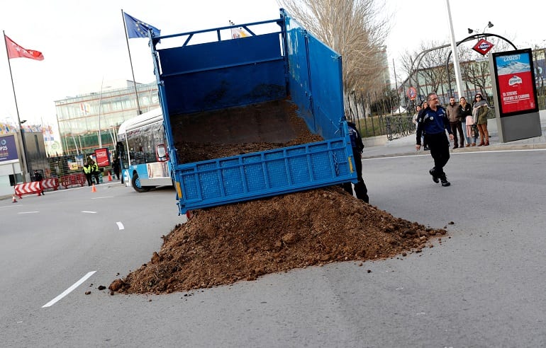 COP25: Activists dump manure outside Madrid summit over world leaders's failure to take meaningful action 