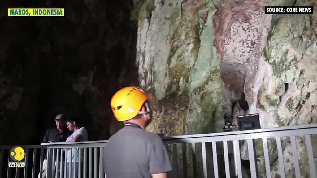 Indonesian cave art is earliest known record of "story telling," researchers say