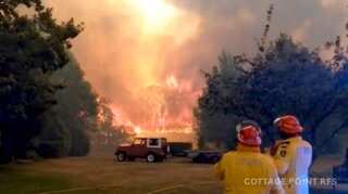 Australian firefighters warn of uncontrollable blazes as conditions worsen