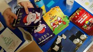 "We can celebrate later": Hong Kongers pen Christmas cards to protesters