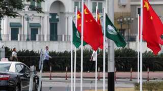 Chinese leader Xi Jinping visits gambling hub Macau as nearby Hong Kong seethes