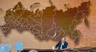 Putin hints at presidential term limit in marathon press conference